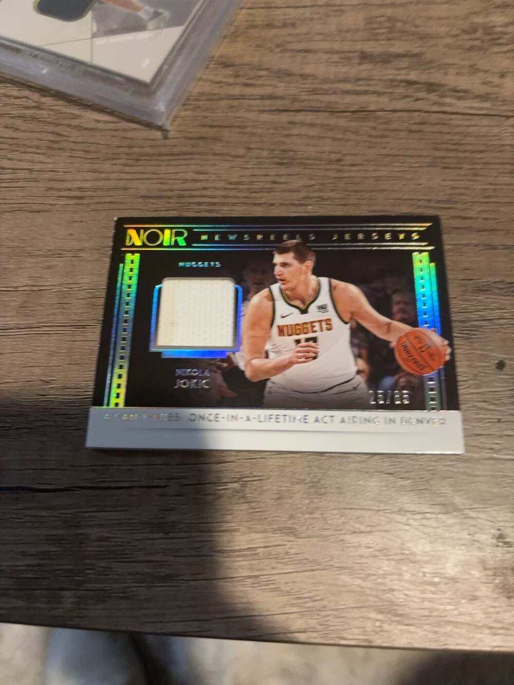 2018-19 Panini Noir Newsreels Jerseys Nikola Jokic Game-Worn Patch Card #NJ-NJK